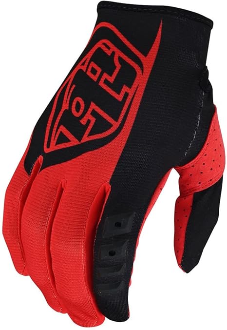 Assorted riding gloves for motocross, mountain biking, street motorcycles, and snowmobiles displayed at Tousley Motorsports.