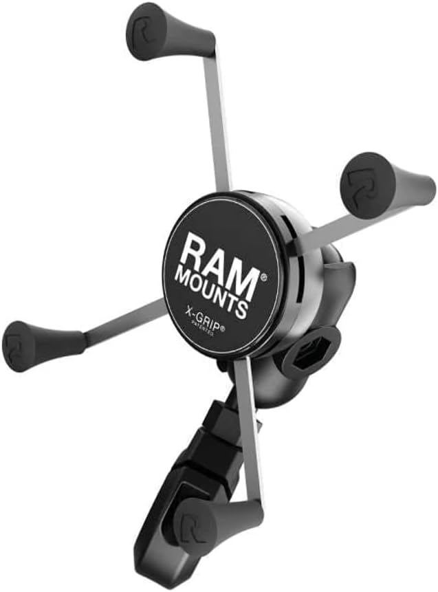 The image shows a black RAM Mount X-Grip holder with four rubber-tipped arms and an adjustable mounting base.
