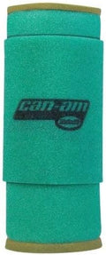 Cylindrical green foam filter with contrasting sealing foam around both ends. The exterior features black Can-Am branding and a removable outer foam layer.