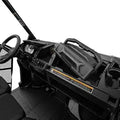 Black molded storage bin positioned in the passenger-side dashboard compartment with a fitted lid, reinforced exterior ribs, and a large Can-Am-branded carrying handle.