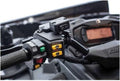 Black textured grip and heated thumb-throttle controls shown installed on a Can-Am ATV. Color-coded buttons integrate neatly with the factory handlebar switch assembly for easy access while riding.