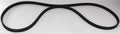 Long black drive belt with evenly spaced molded teeth along the inner surface. Its reinforced, flexible construction is shaped for proper engagement with the factory drive pulleys.