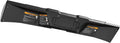 Long black molded roof panel with contoured edges, recessed center detailing, and multiple mounting points. Factory warning labels and installed fasteners are visible along the inner surface.