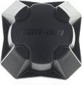 Black molded wheel cap with an angular, rugged design, textured finish, and recessed Can-Am logo at the center. Sold individually; verify wheel and vehicle compatibility before ordering.