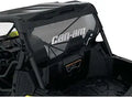 Black woven cargo net stretched across a Commander cargo box and secured at multiple points, holding a spare tire firmly in place.