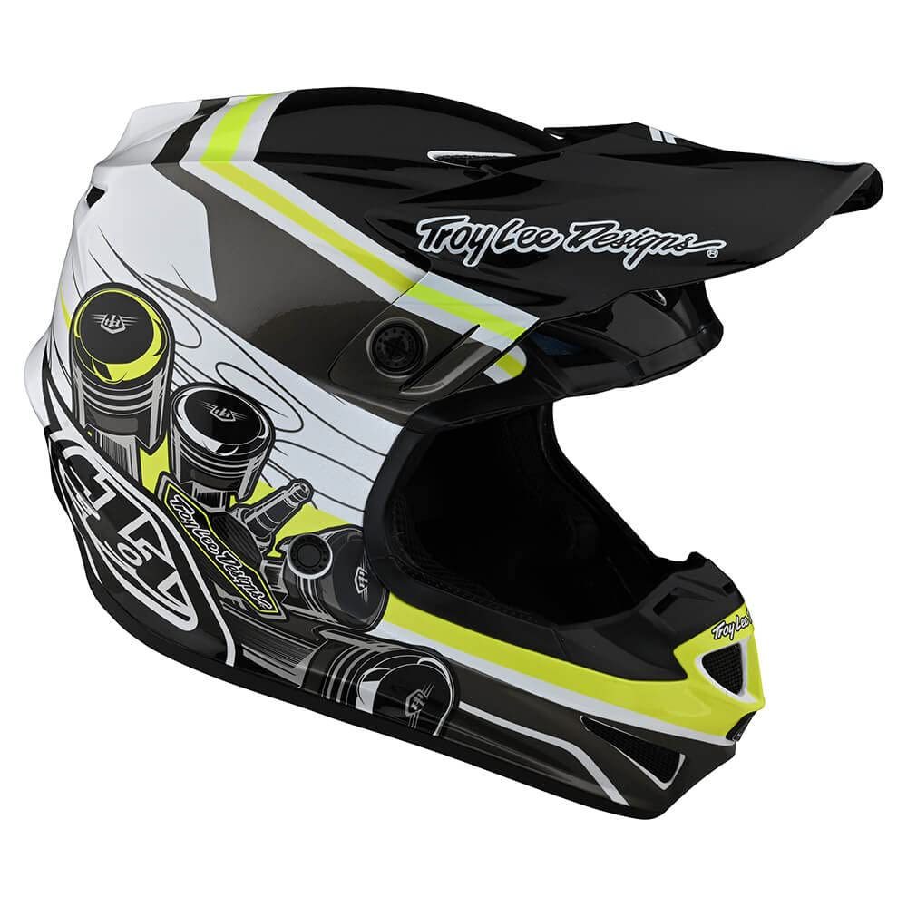 Black and yellow Troy Lee SE4 off-road dirt bike helmet