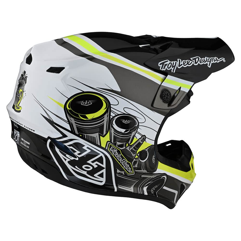 Black and yellow Troy Lee SE4 off-road dirt bike helmet