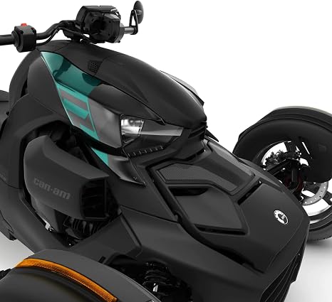 The image shows the Nitro Blue accent panels installed on a black Can-Am Ryker, adding bright blue-green detailing along the upper side bodywork near the front lighting. Verify model-year compatibility before ordering.