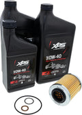 Three black bottles of XPS SAE 0W-40 4T engine oil, a cartridge-style Rotax oil filter, and three replacement sealing rings. The bottles are labeled “Full Synthetic,” not synthetic blend, so the oil type in the listing title should be corrected or verified before publishing.