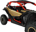 Large black extended fender flares installed around the front and rear wheel openings of a gold-and-red Can-Am Maverick X3.