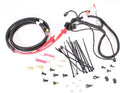 The kit includes protected wiring harnesses, heavy-gauge power cables, electrical connectors, terminal covers, cable ties, and mounting hardware. Color-coded leads and molded connectors simplify proper routing and connection.