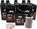 Six black bottles of XPS SAE 5W-40 4T oil, one cylindrical oil filter, and assorted replacement O-rings. The bottles shown are labeled “Synthetic Blend,” not full synthetic, so the listing title and product should be verified before publishing.